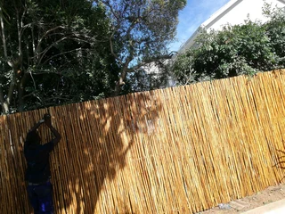 Wooden fence latle,bamboo and Roll on grass
