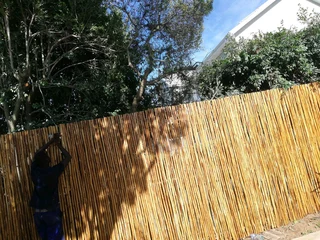 Wooden fence latle,bamboo and Roll on grass