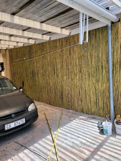 Wooden fence latle bamboo and Roll on grass