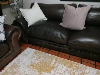 Coricraft Afrique genuine leather 3 and 4 seater lounge suite