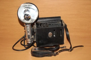 Vintage retro A Graphlex speed camera bag and flash