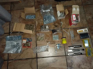 Mixed items,  Drill bits,  lots and lots of skrews and nails This a huge bargain for a handyman and