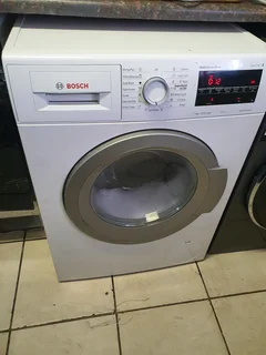 White Bosch series 6 front loader washing machine