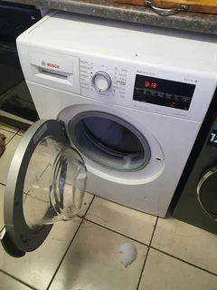 White Bosch series 6 front loader washing machine