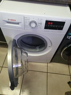 White Bosch series 6 front loader washing machine