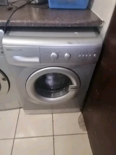 Silver defy front loader washing machine
