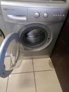 Silver Defy front loader washing machine