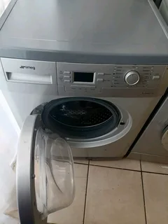 8kgs Silver Smeg front loader washing machine