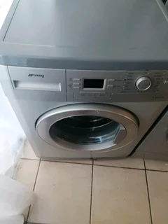 8kgs Silver Smeg front loader washing machine