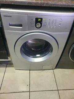 Silver Samsung front loader washing machine