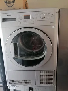 Silver Smeg condensor tumble dryer