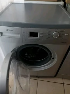 8kgs Silver Smeg front loader washing machine