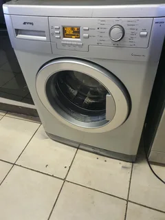 8kgs Silver Smeg front loader washing machine