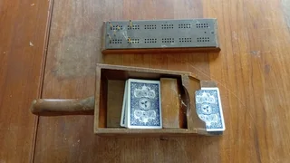 Hard wood playing card dealing shoe and brass lined cribbage board nice condition