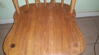 Round wooden table in good condition.Nice wood and polishes up nicely.PLUS Oak chair