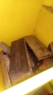 Job lot of dark hardwood parquet floor blocks .These are the large block measuring7.5cm wide x 23cm