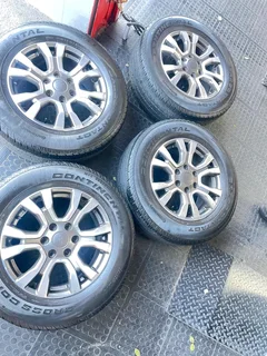 Original OEM Ford Ranger mags and Continental tyres X 4 with plus minus 70% life left...