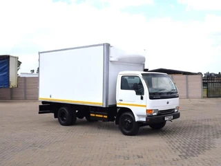 2009 Nissan UD40 Volume Body Truck