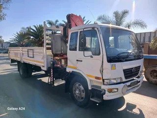 2011 NISSAN UD UD90 9TON DROPSIDE TRUCK WITH FASSI F170 CRANE