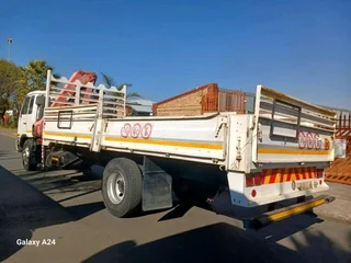 2011 NISSAN UD UD90 9TON DROPSIDE TRUCK WITH FASSI F170 CRANE