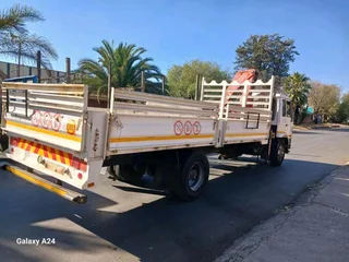 2011 NISSAN UD UD90 9TON DROPSIDE TRUCK WITH FASSI F170 CRANE