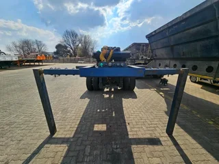 2017 PARAMOUNT QUAD AXLE SLOPE DECK WITH SINGLE AXLE DOLLY