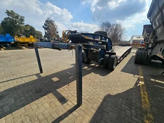 2017 PARAMOUNT QUAD AXLE SLOPE DECK WITH SINGLE AXLE DOLLY