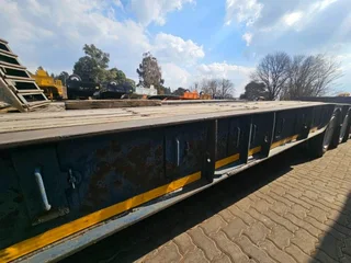 2017 PARAMOUNT QUAD AXLE SLOPE DECK WITH SINGLE AXLE DOLLY