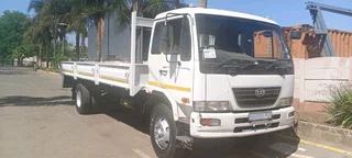 2010 NISSAN UD UD100 DROPSIDE TRUCK