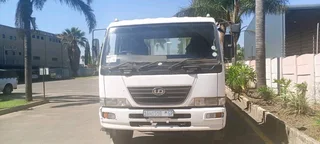 2010 NISSAN UD UD100 DROPSIDE TRUCK