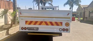 2010 NISSAN UD UD100 DROPSIDE TRUCK