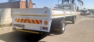 2010 NISSAN UD UD100 DROPSIDE TRUCK