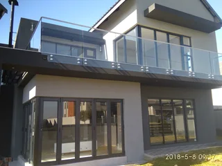 Aluminium Windows and Doors\ Aluminium Garage Doors\ Folding Doors \ Sliding Doors\ Pivot Doors