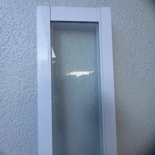 Glass (window) corner panel with white frame