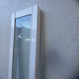 Glass (window) corner panel with white frame