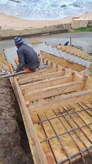 Retaining walls, driveways, boundary walls and concrete staircases