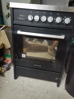 Kelvinator 4 burner gas stove electric oven