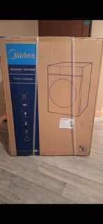 Midea 6kg front load washing machine for sale.