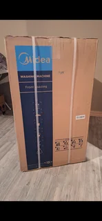 Midea 6kg front load washing machine for sale.