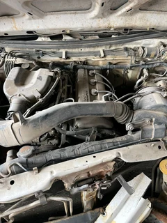 Stripping Nissan Hardbody KA24 For Spares