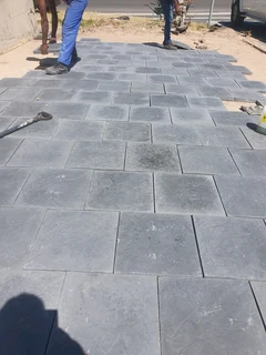 Paving slabs supply and installation.