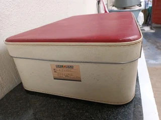 Red and cream retro suitcase.