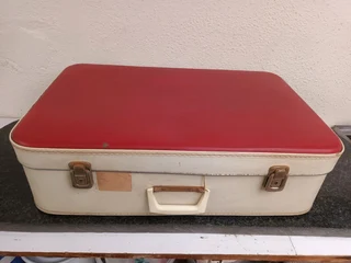 Red and cream retro suitcase.