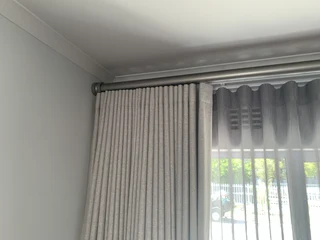 Curtain poles. ( wood )