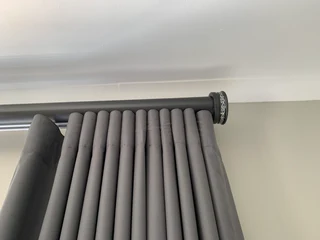 Curtain poles. ( wood )