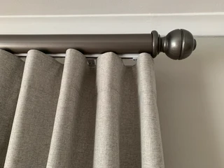 Curtain poles. ( wood )