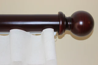 Curtain poles. ( wood )