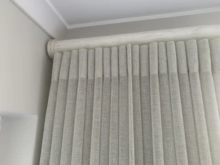 Curtain poles. ( wood )