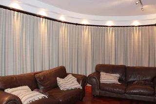 Curtain poles. ( wood )