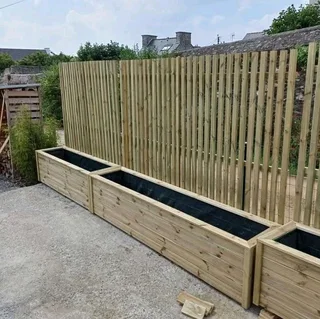 Planter boxes and wood fencing